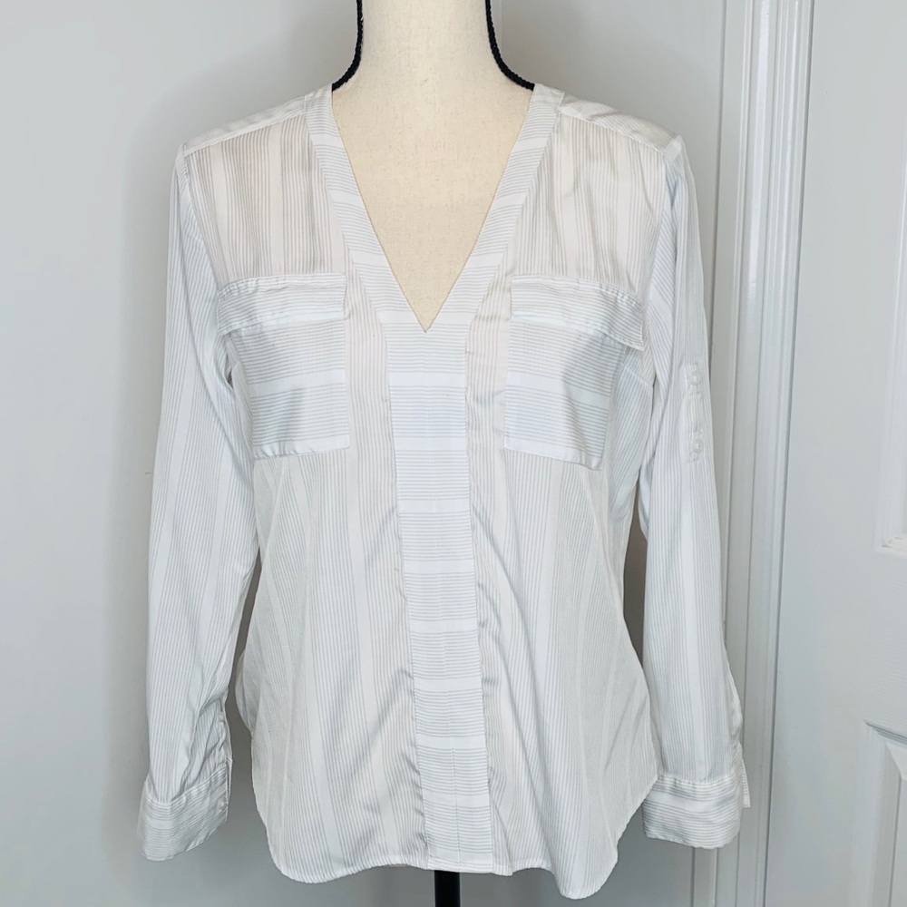 Women’s express convertible sleeve V neck blouse